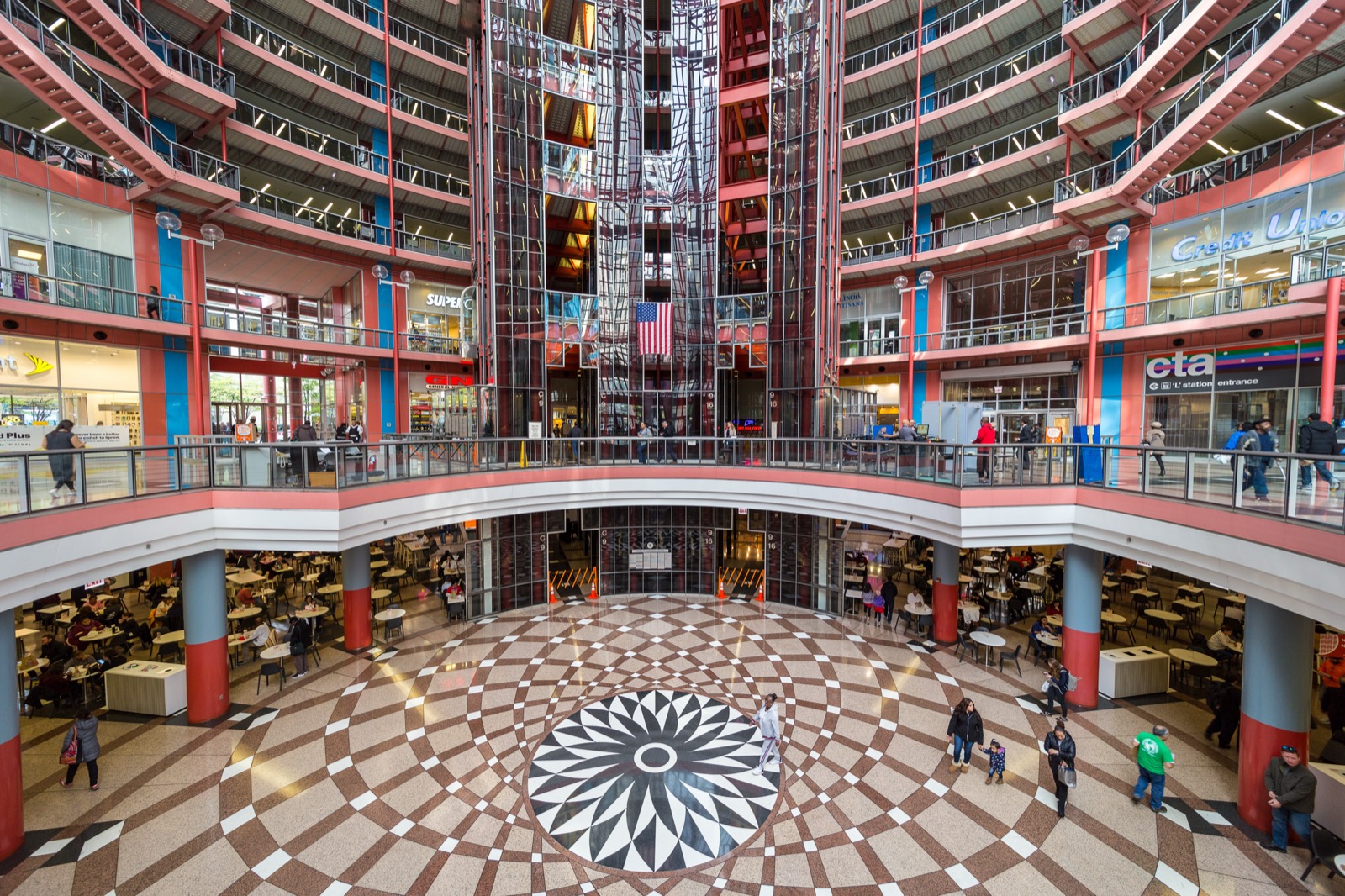 Looking straight up through the seventeen-story glass atrium of the James R. Thompson Center, with rings of balconies and skylights converging overhead