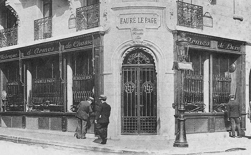 Black and white photo of the Fauré Le Page corner shop in Paris, with a founding-date sign under the name and rifles in the windows
